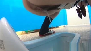 Japanese babes pee and get filmed doing it in the bathroom