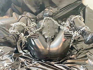 Shiny bodysuit chain bondage