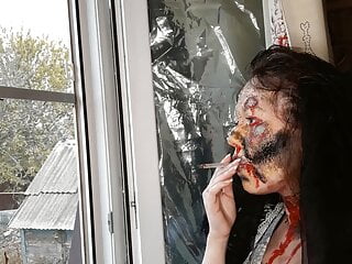 Wife smokes cigarette makeup zombie