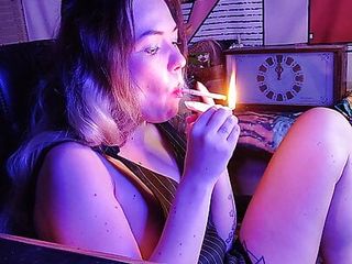 Sexy stepsister smokes a cigarette